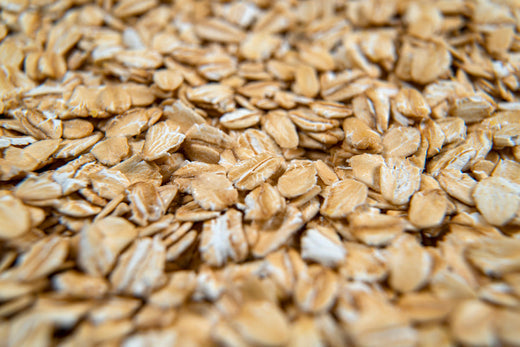 A background of oats for the blog title 'What Is the Difference Between Rice/Oat Mycelium Chaga and Wild Harvested?'. Note, that Forage Hyperfoods uses only Wild-Foraged/Harvested Canadian Chaga.