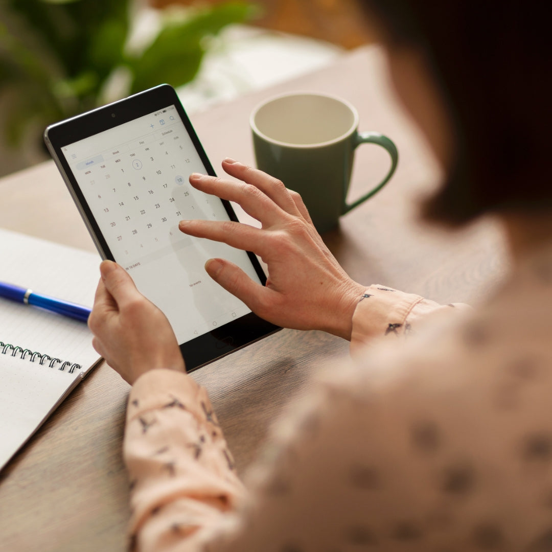 A woman browsing her schedule. 