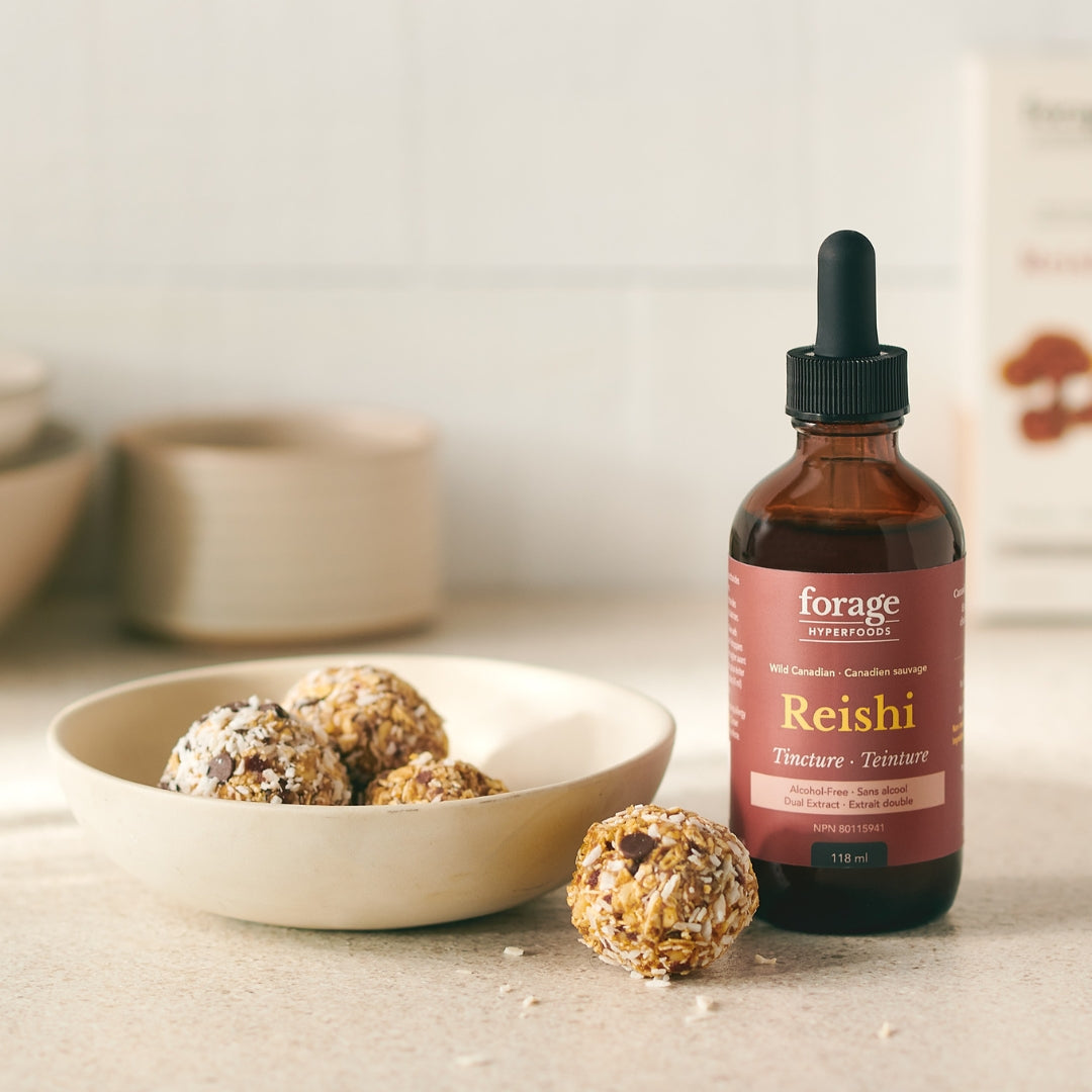 A tincture with energy balls next to it.