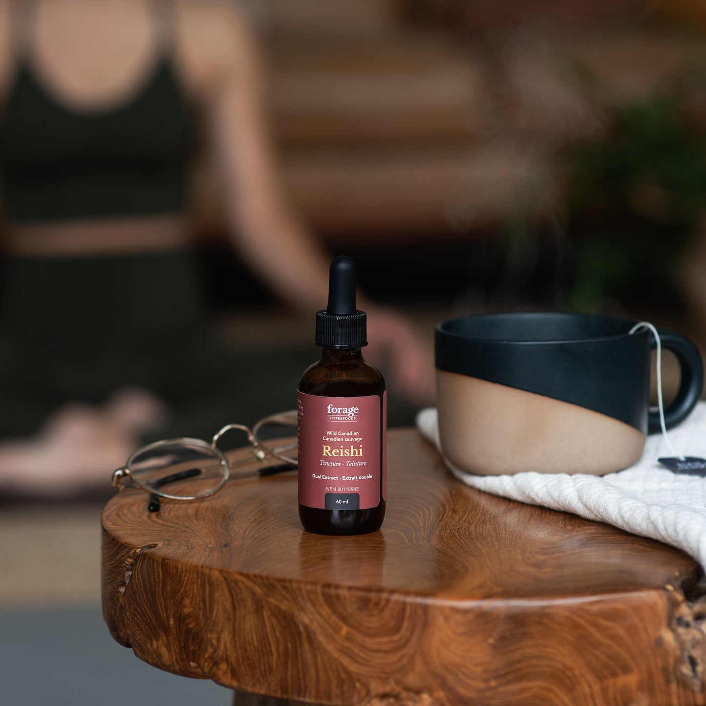 Reishi Original tincture in a yoga studio with a small 60Ml format.